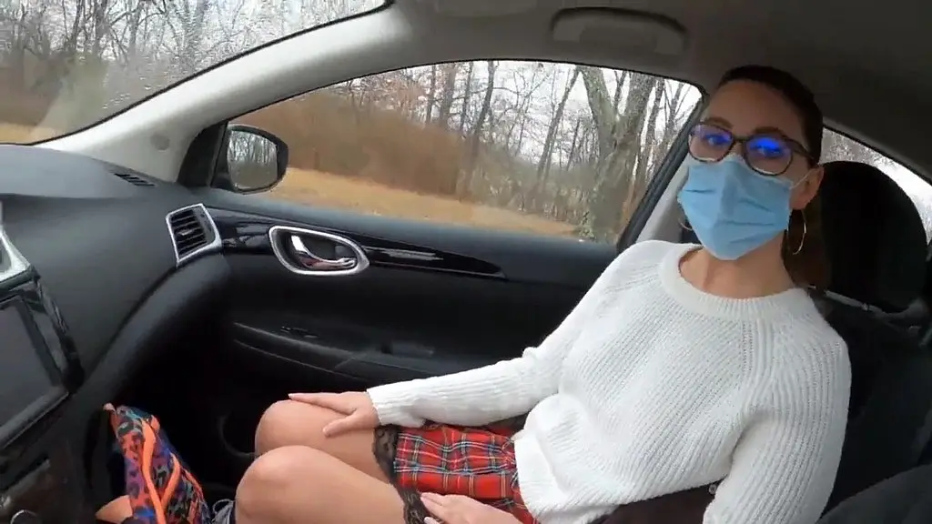 teen girl in plaid skirt gets a ride to school from a stranger on a snowy day