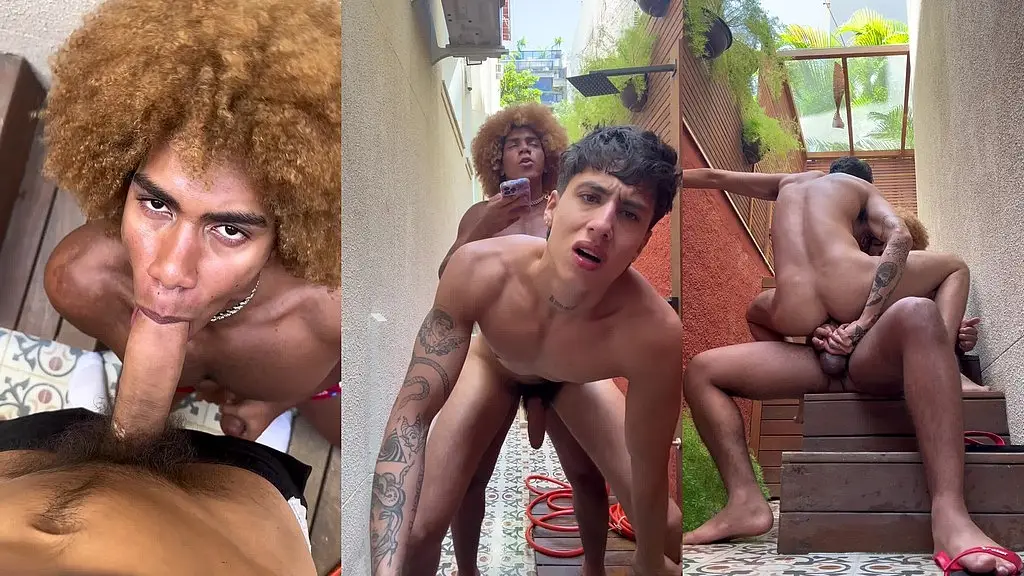 dois pauduzos fudendo do lado de fora do predio com os vizinhos olhando