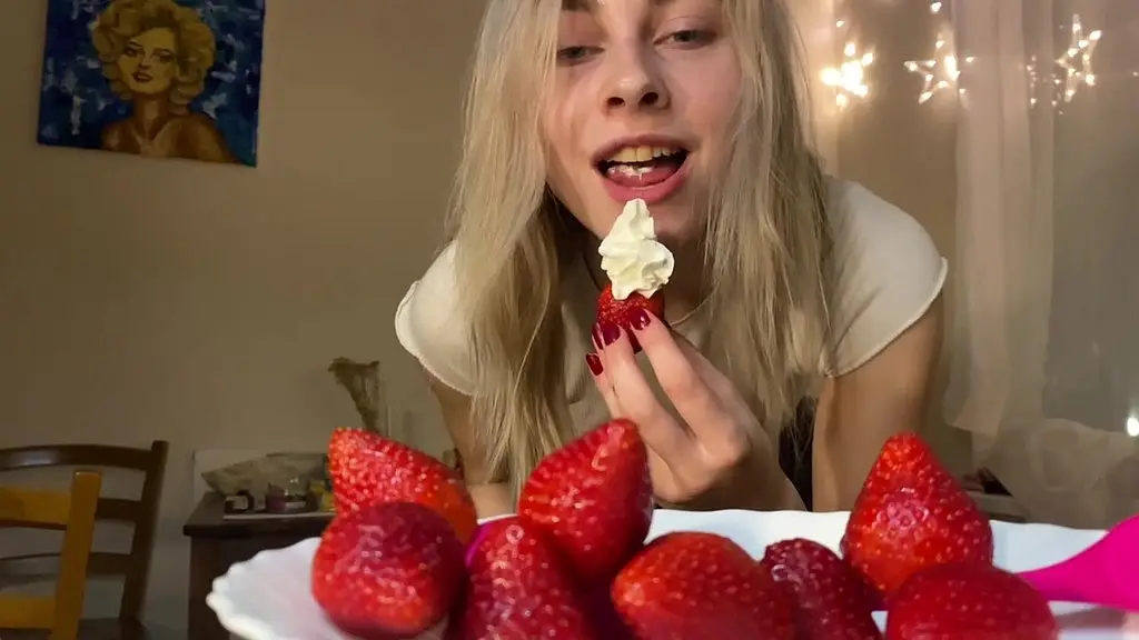 eats strawberries with cream, and then caresses pussy and anal