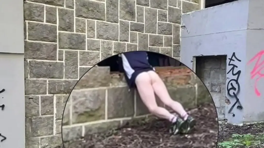 amateur boy trapped, his hands held, pantsed and his pale, hairless bum exposed