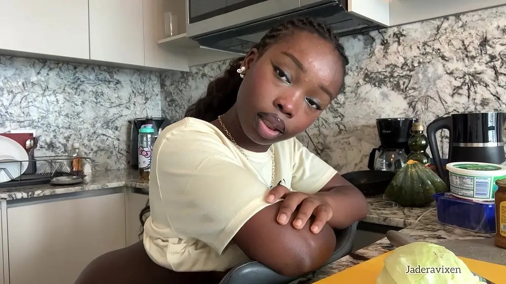 jadera vixen entertains herself while cooking