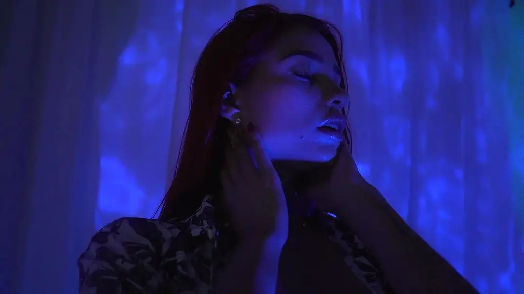 galactic redhead latina masturbates in a cosmic dream room