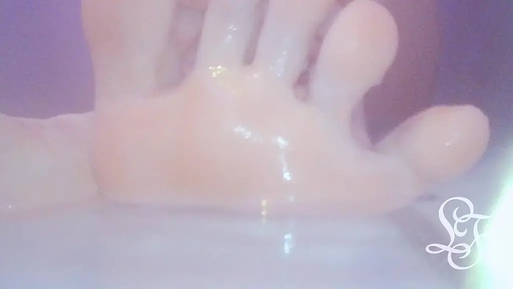 washing and tickling my feet in the bathub!