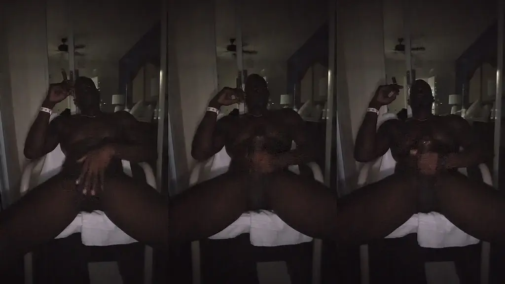 sir maxximus smoking a cigar and stroking his big black dick outside