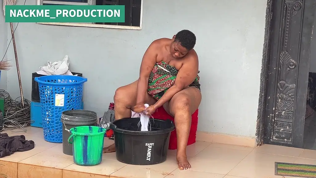 african mama multitasks on a sunday morning