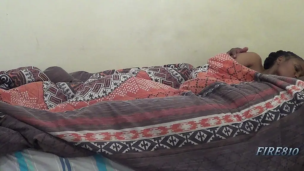 deep kissing while playing with a strange object under the duvet