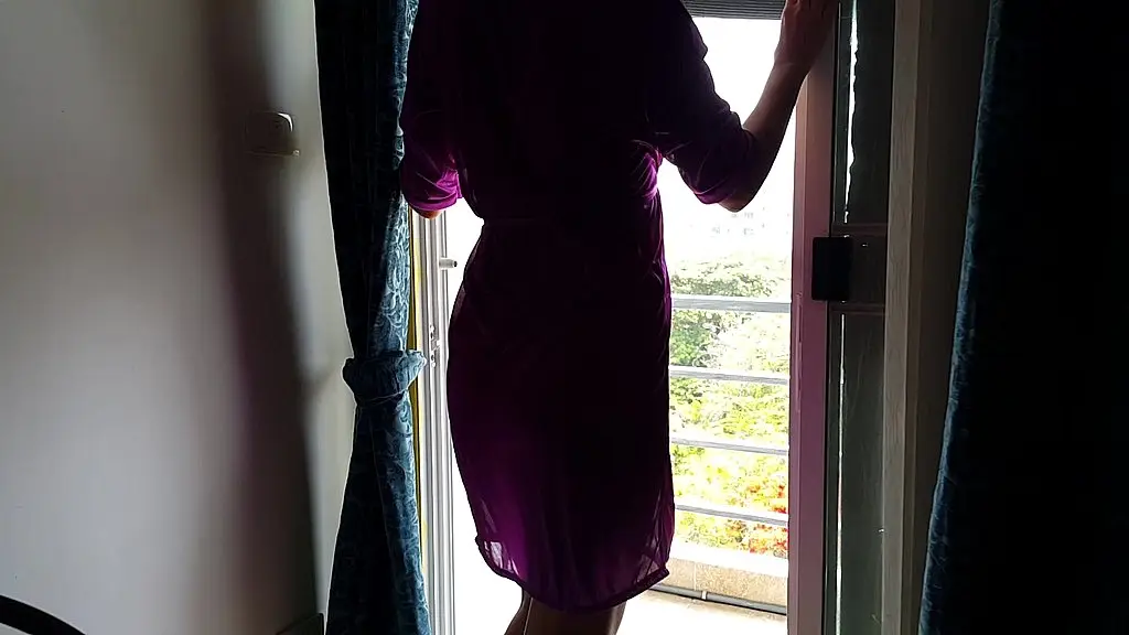 close up piss from behind at the balcony