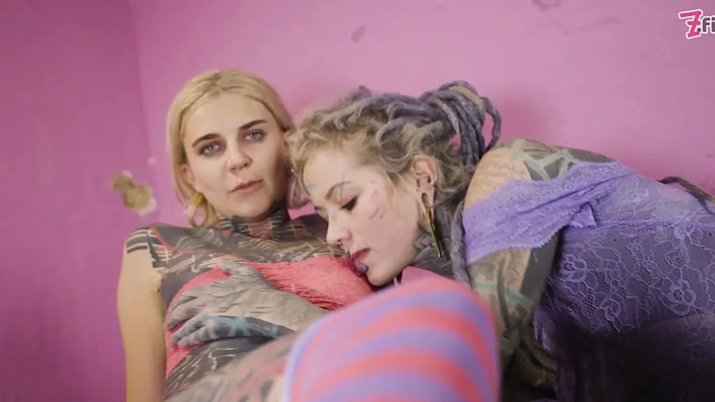 tattooed alt girls having wild lesbo fun with strap on