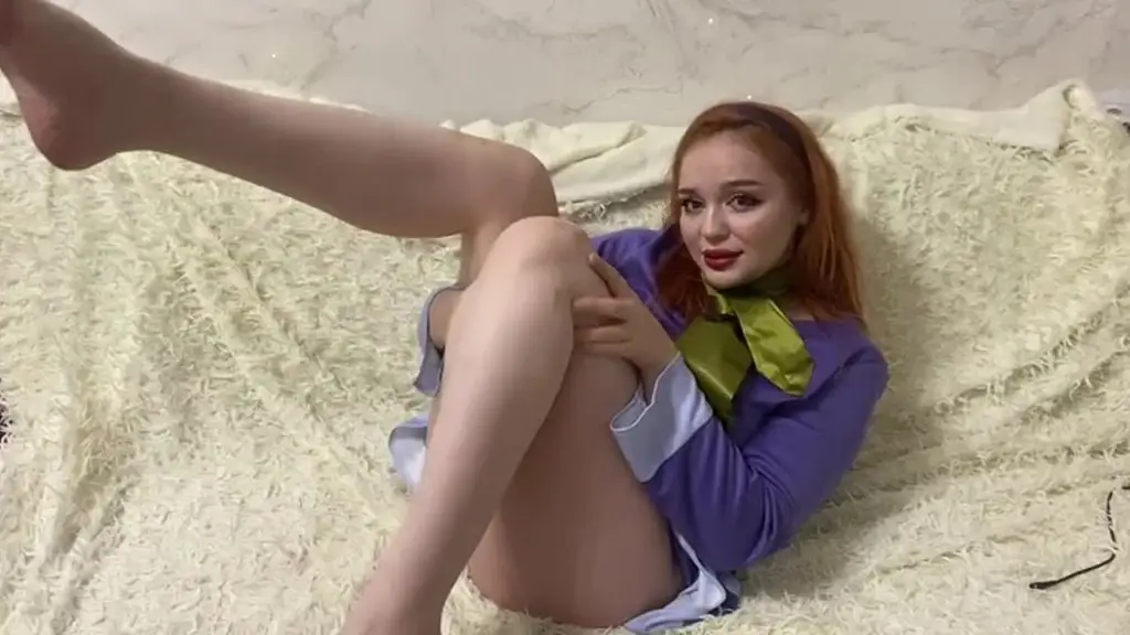 daphne from scooby doo plays with a rubber dick and cums