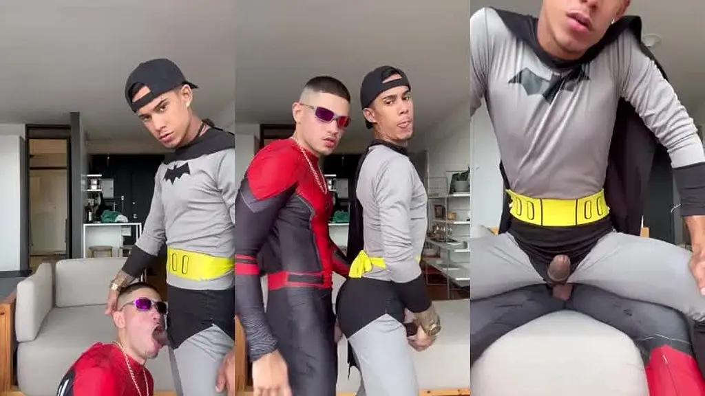 batmam sentando na pica do aranha