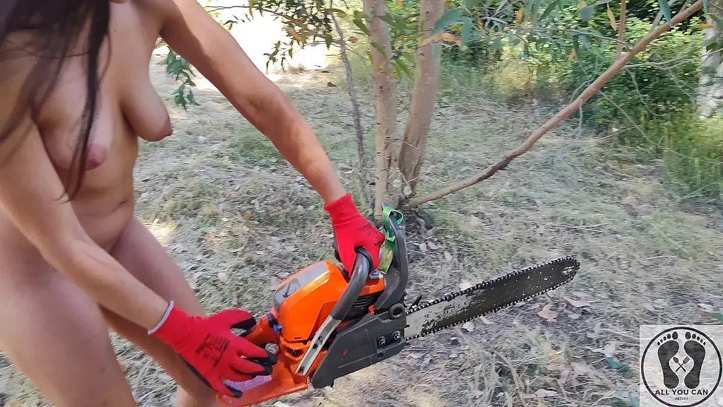 gasoline chainsw naked girl cutting branches
