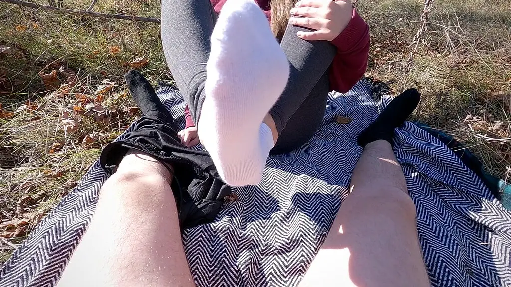 sockjob in a sunny autumn park