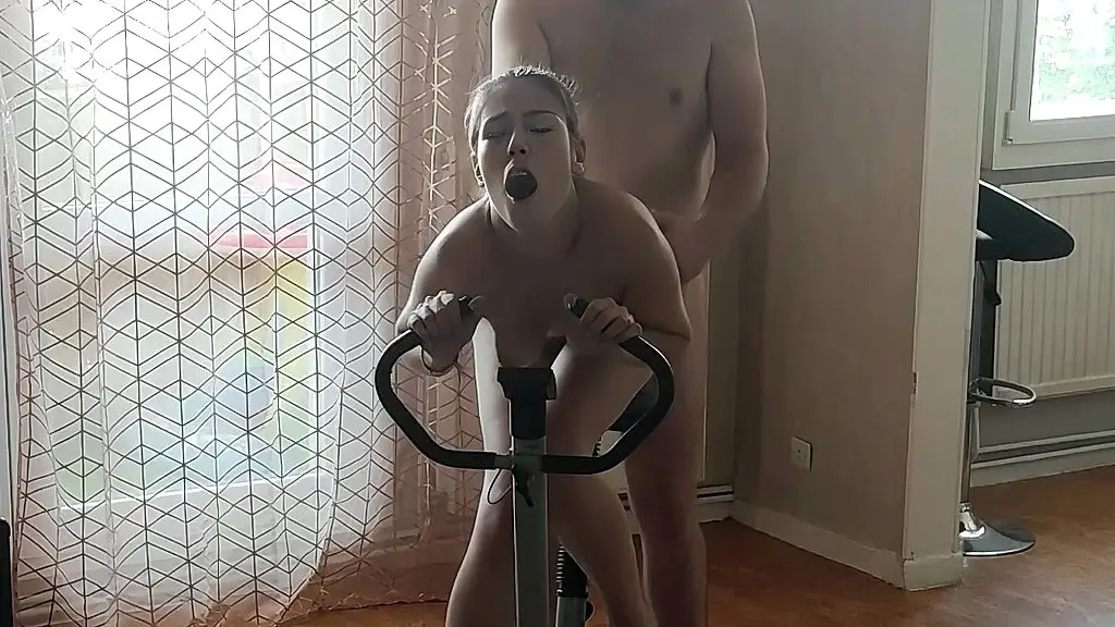 coquette in leggings gets fucked doggy style on the exercise bike
