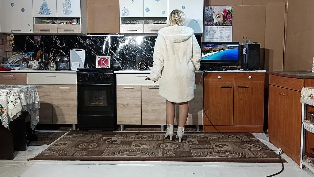 new fur coat - posing on kitchen
