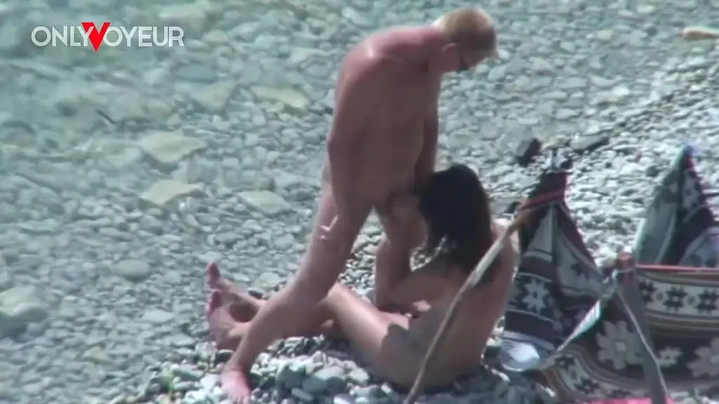 risky voyeur footage of slut wife gives blowjob then takes standing fuck on public beach