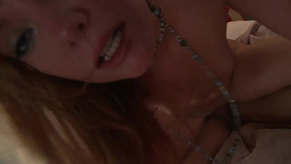 pretty 18-year-old redhead, dani jensen, takes off her dress, revealing her tight little...