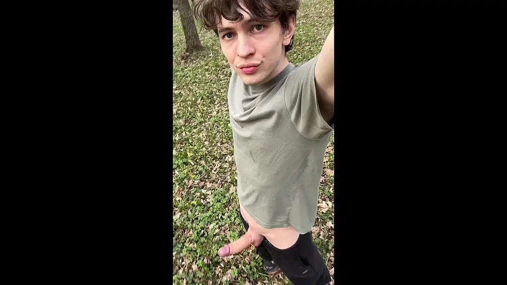 sexy twink plays risky with his huge veiny cock in the woods
