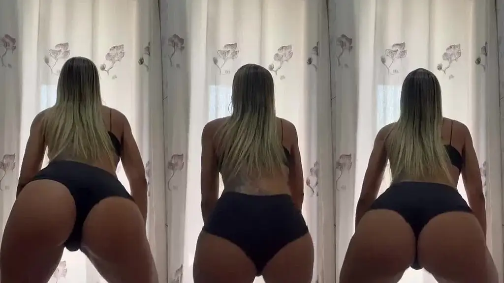 dancando de shortinho bem cravado marcando a bucetona