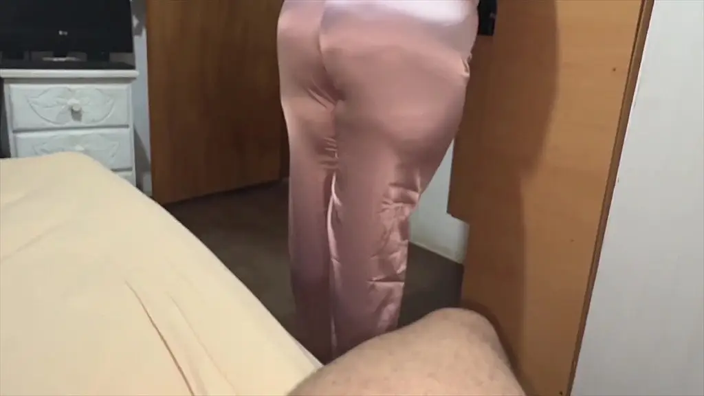 stepmother discovers her stepson masturbating while looking at her big ass.