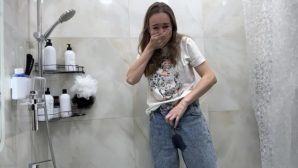 desperately pissing in jeans