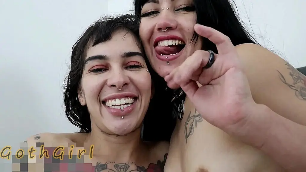 two goth sluts having a lesbian encounter after playing tarot.