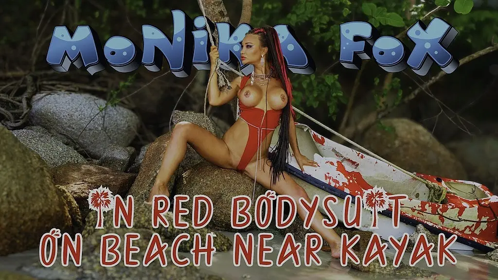 hot monika fox in red bodysuit on beach near kayak
