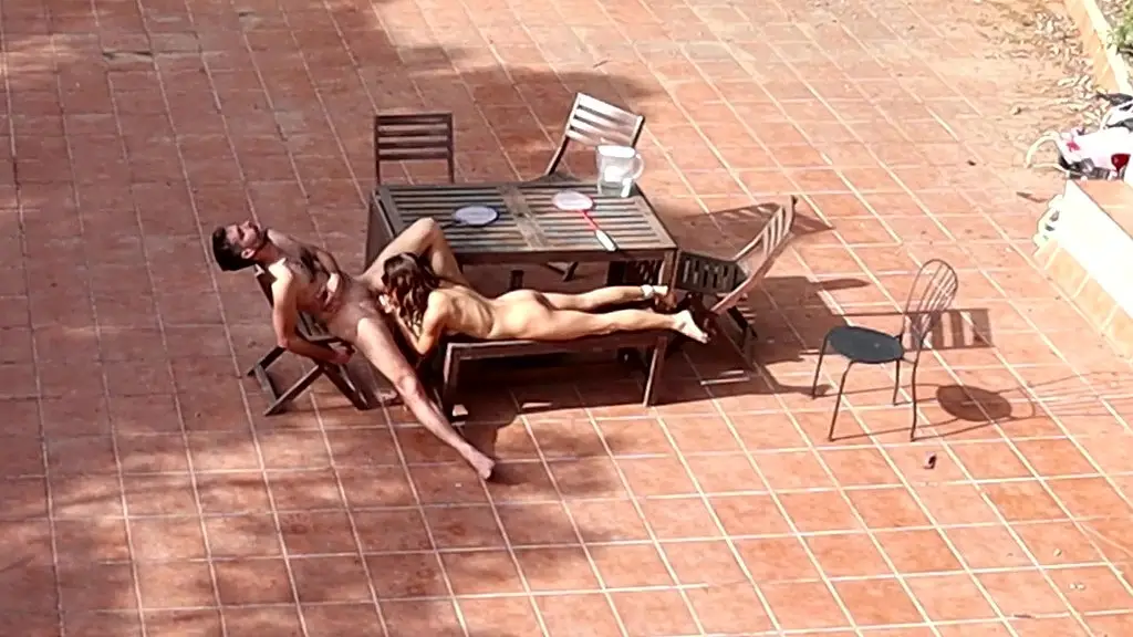 couple playing and fucking in the courtyard, outside
