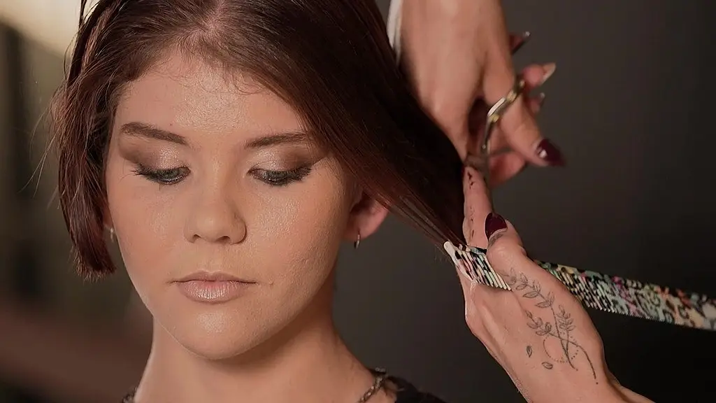 nikita gets a surprising new look - shaved smooth (step 2)
