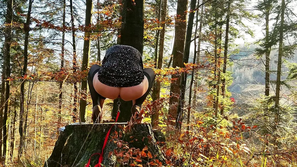 posing with a butt plug stuck up the ass