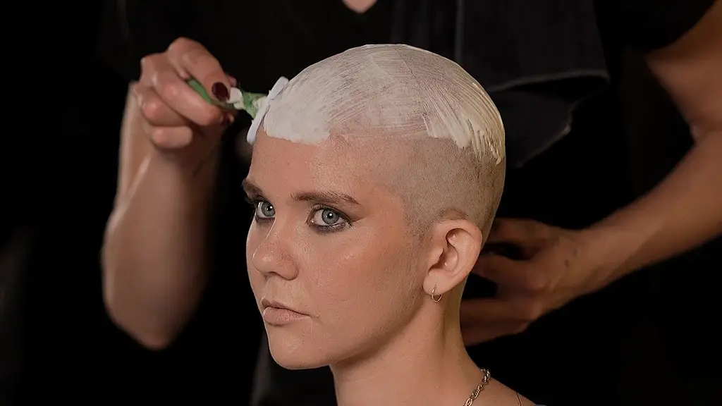 nikita gets a surprising new look - shaved smooth (step 4)