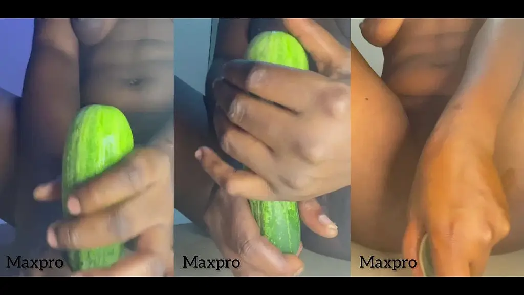 fucking my wet black pussy with a big cucumber for the first time