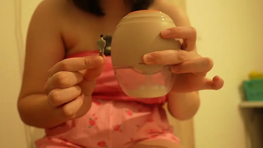 giantess milk pumping her huge breasts tiny man trapped in a milk bath