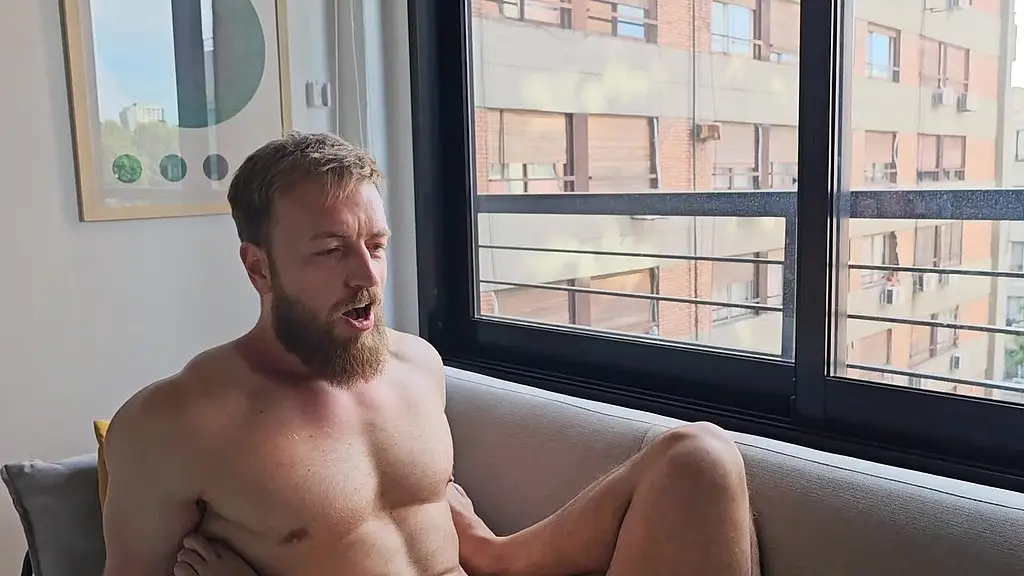 a hairy russian with a big cock fucks me on the couch and puts his foot in my mouth for me to suck