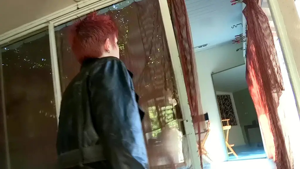 red pixie in fishnets: punk girl works over two tanned girlfriends