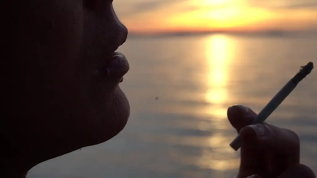 smoking cigarettes on the beach... at day and in sunset