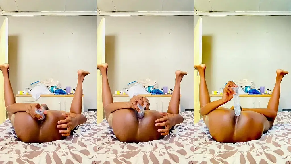 enjoying strokes with a dildo